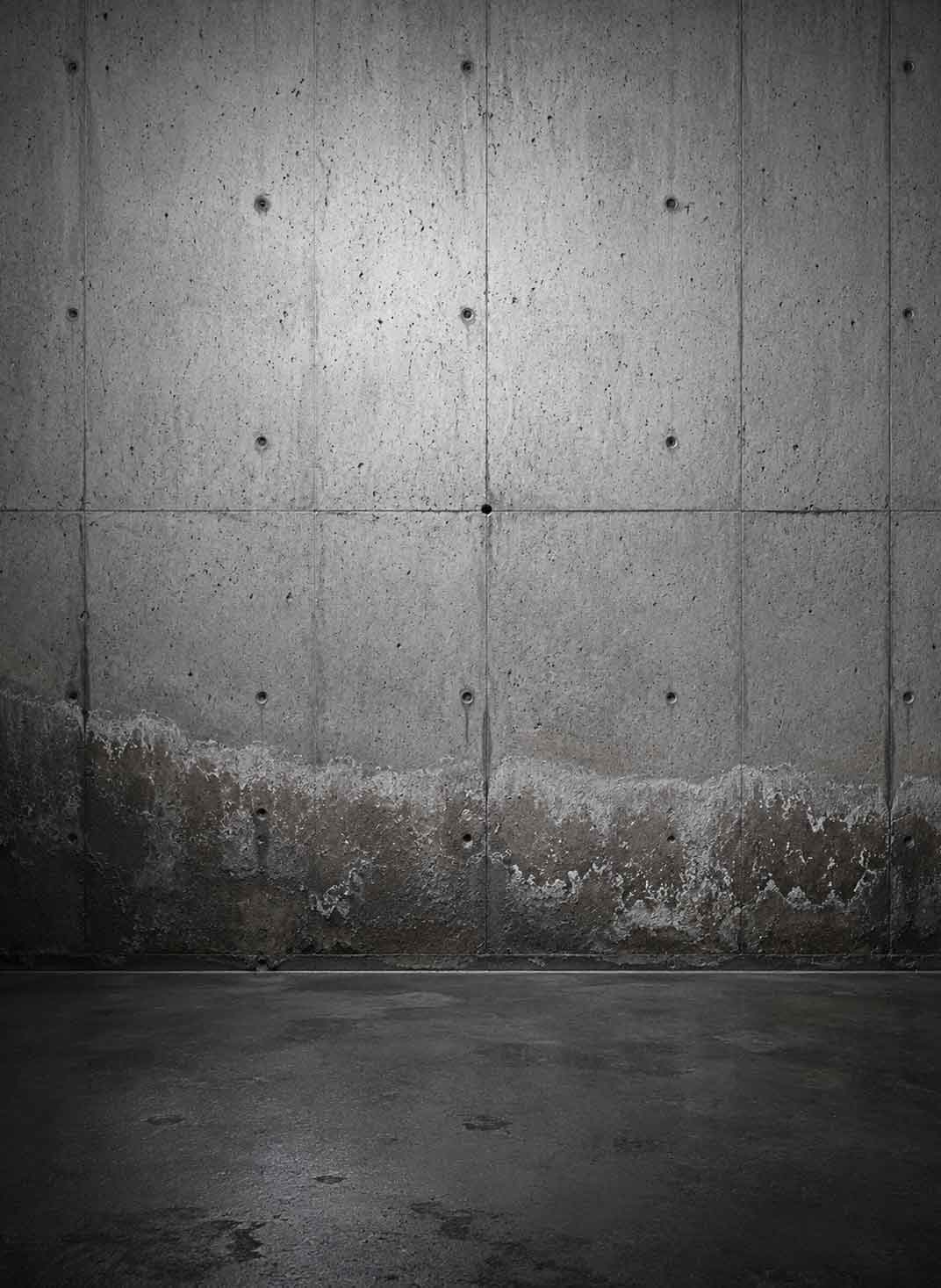 Betonnen wand als symbool voor vochtbestrijding